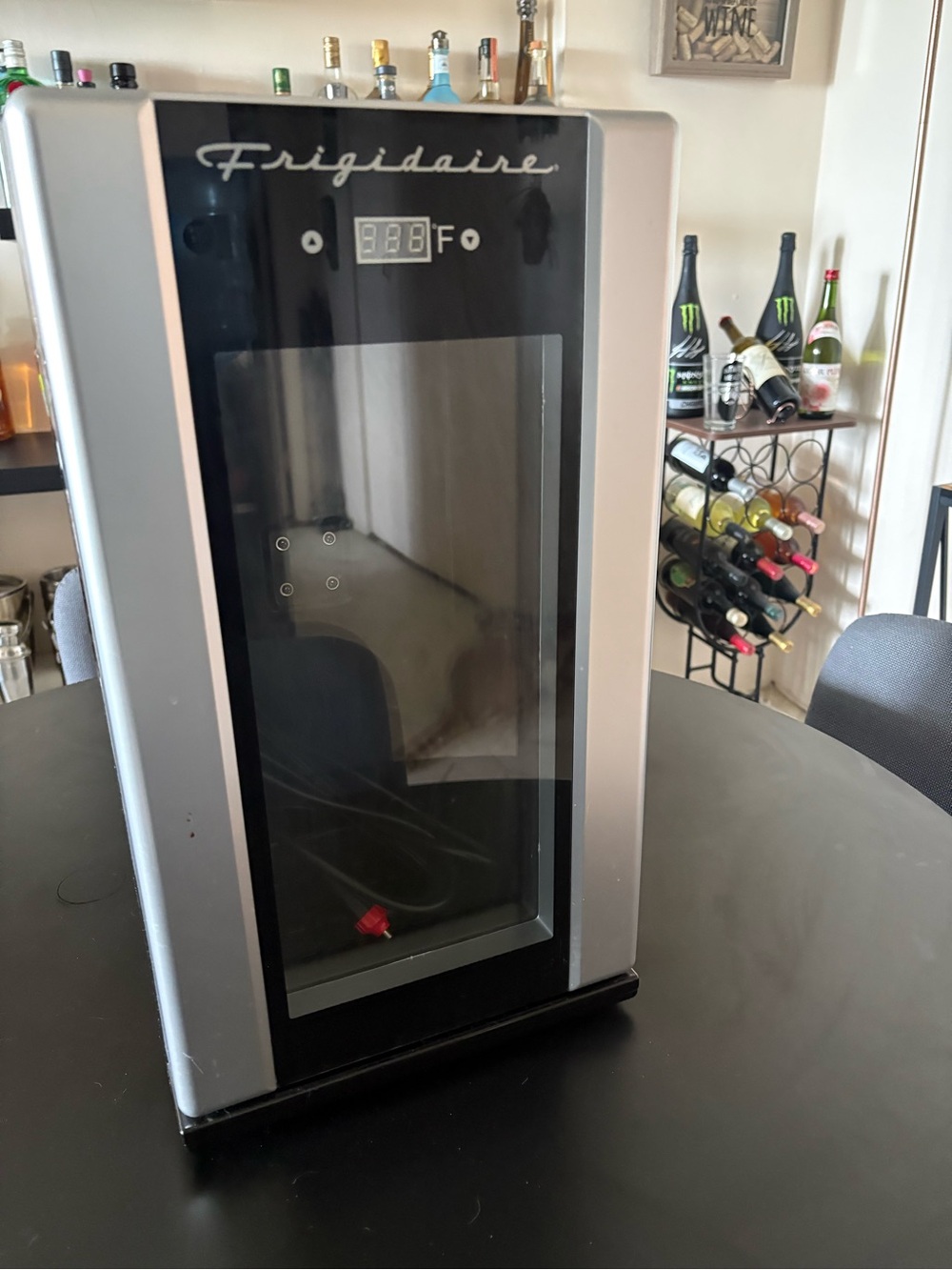 Frigidaire Silver and Black Compact Beverage Cooler - Sleek Mini Wine Fridge